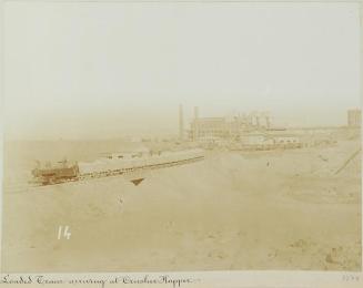 Pampa and oficina views. Loade train arriving at  crusher hopper