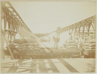 Pampa and oficina views. Loading trucks for transport to Iquique