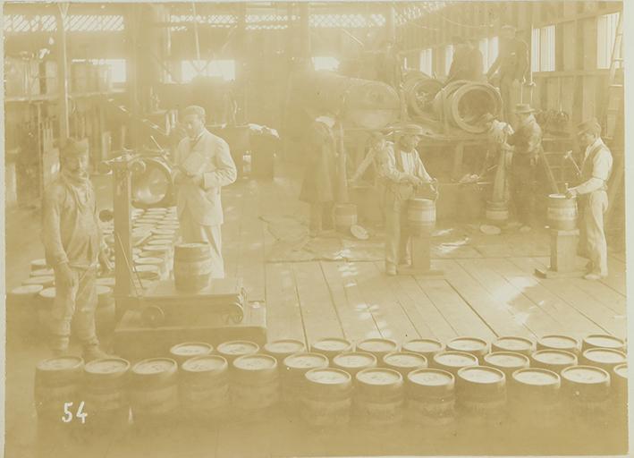 Pampa and oficina views. Interior of iodine house. Packing iodine in barrels