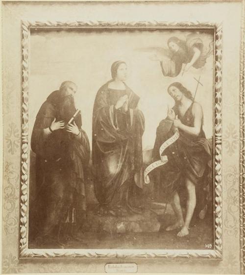 (Pintura de San Juan Bautista, una santa y un santo de Francesco Raibolini)