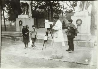 Fotógrafo minutero en la plaza de Oriente