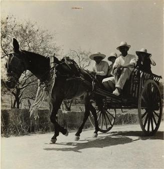 (Campesinos en carreta)